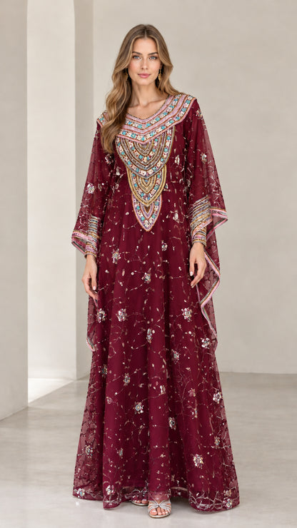 Full-length view of woman wearing Burgundy embroidered kaftan maxi dress