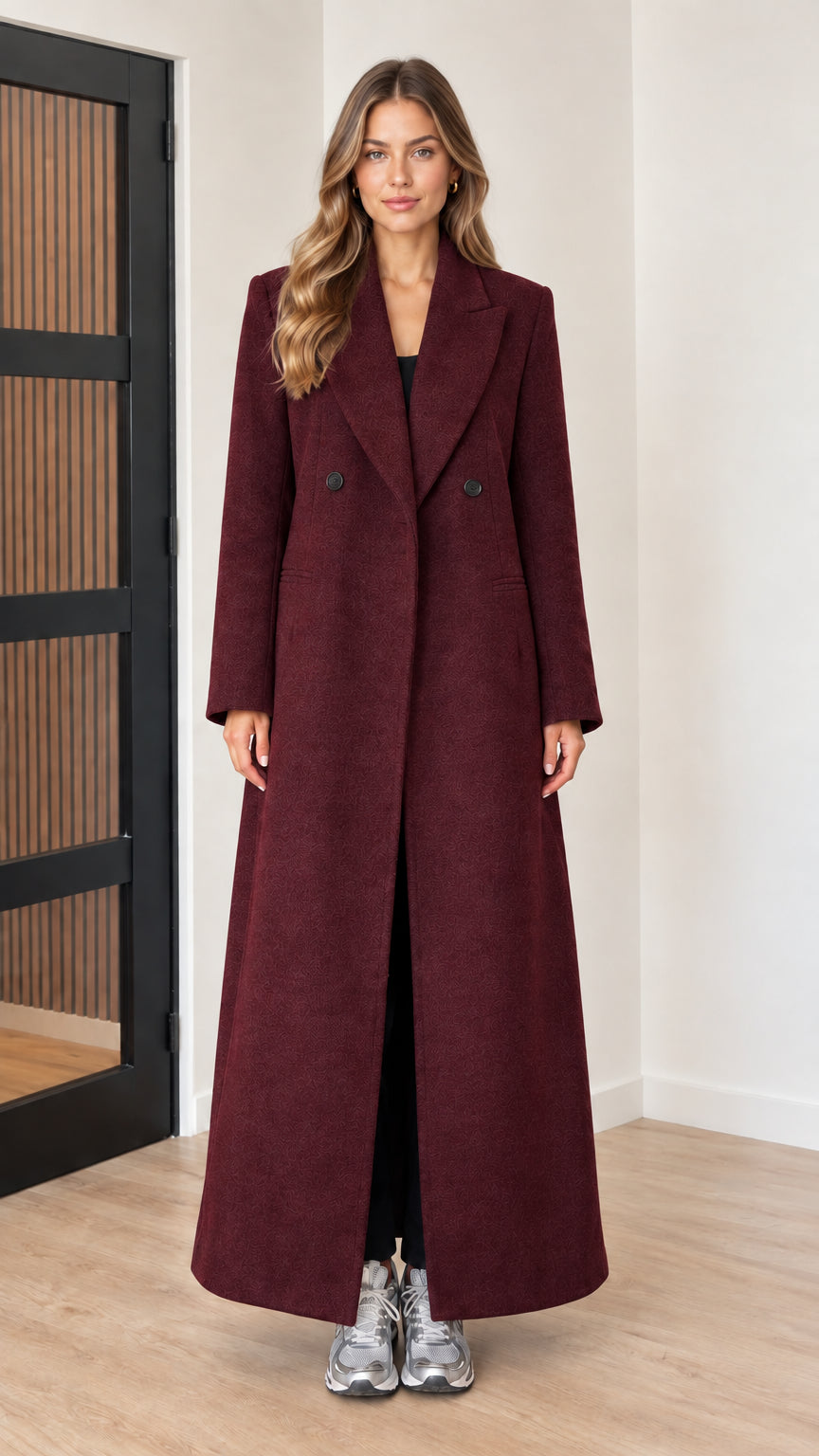 Front view of woman wearing burgundy wine red maxi coat