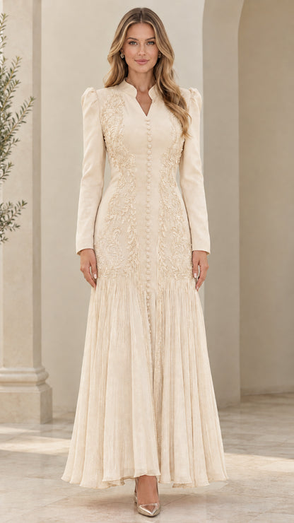 Front view of cream champagne long sleeve embroidered pleated maxi dress